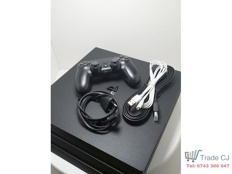 PlayStation 4 Pro 1TB PS4 CUH7216B console, 1 stick, 5 games included