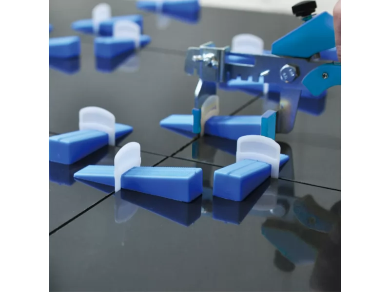 Kit nivelare placi gresie si faianta, 100 distantiere 1,5mm autonivelante, 100 pene, 1 cleste